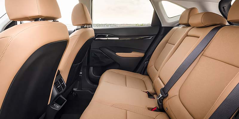2026 Kia Seltos rear seats featuring spacious and stylish tan upholstery