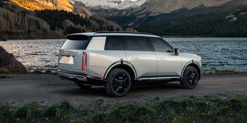 Kia white Telluride - Lake side view 